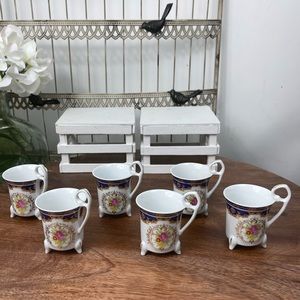 Porcelain floral footed teacups.